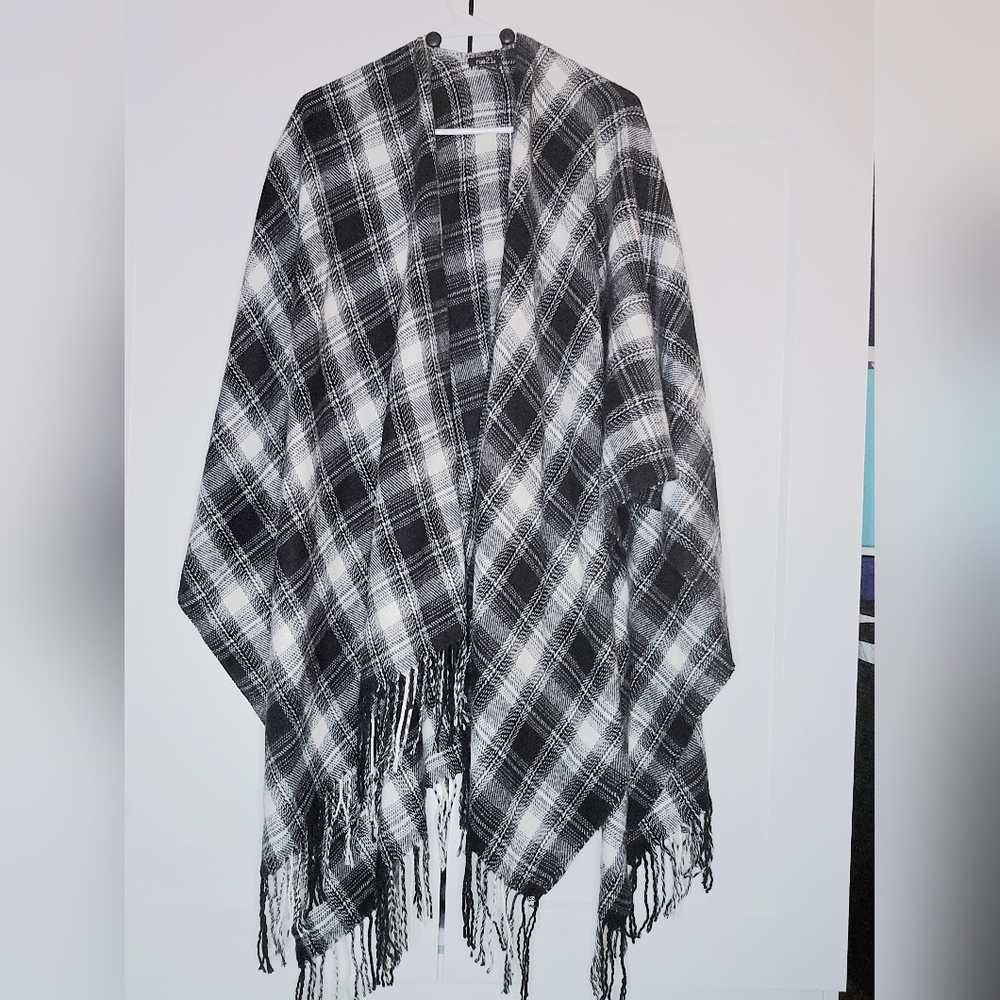 Like new never worn Rue 21 black and white plaid poncho sweater one size